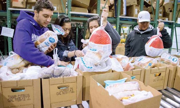 Gallup Rotary Club hands out 100 food baskets