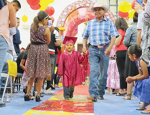 Youngest To’Hajiilee graduates step up and onto path to higher education