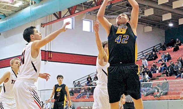 Bloomfield holds off Shiprock to claim title