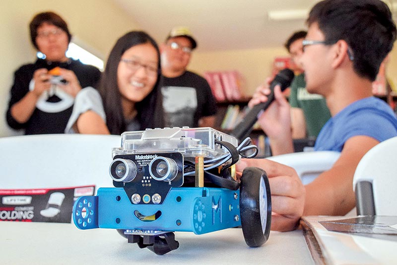 Koreans teach Leupp kids computer science