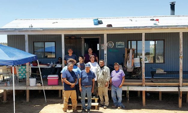 Church, volunteers repair roof for Lewis