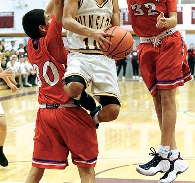 Winslow outduels Holbrook before packed house