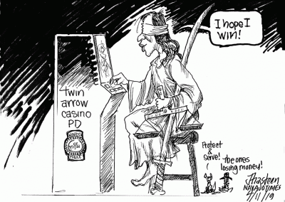 Lady Justice tries to play slot machines, with label of Twin Arrow Czsino PD on side of it. Justice says, "I hope I win!"