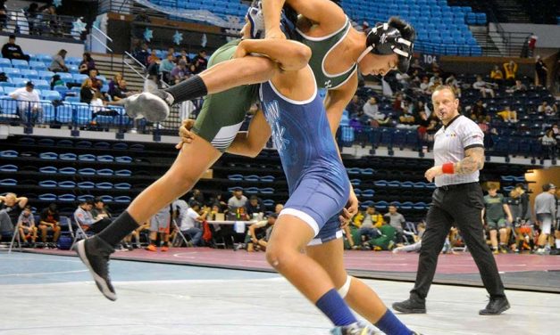 ‘It was like East meets West’:  Veterans Memorial tourney threw grapplers into the fire