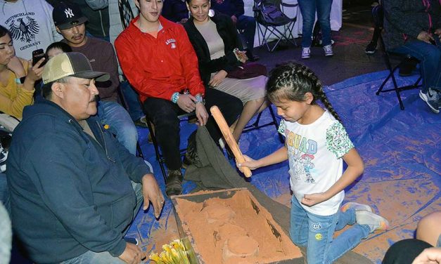 A sense of home: 10th annual shoe game brings songs, laughter to urban Navajos