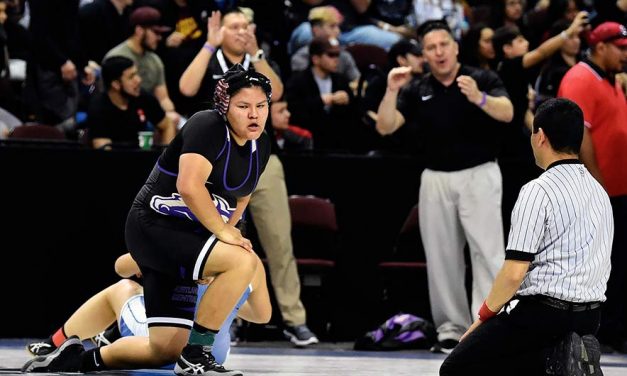 Being cut from b-ball fortuitous for KC wrestler