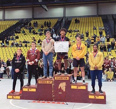 After 14-year break, wrestler goes for pin to win state