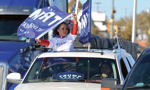 Trump claims victory with key states still in play