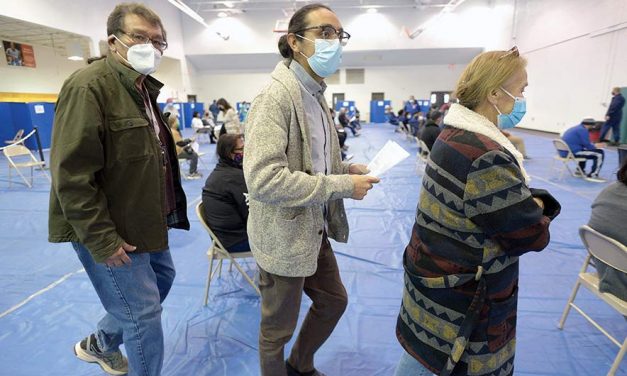‘For their protection’: Vaccine gives hope to family, health worker