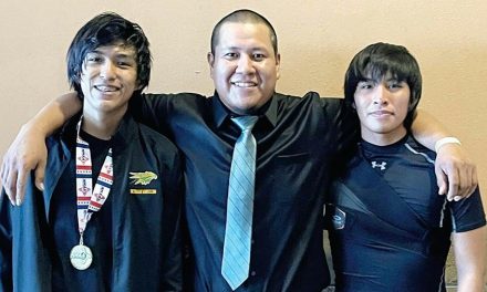 Newcomb Skyhawk makes histor: Junior wins first-ever state wrestling title, fulfills dream