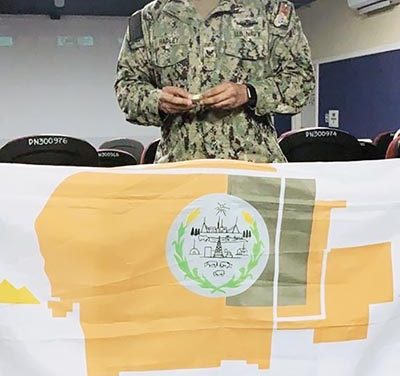 People | Chinle sailor posts Diné flag at camp