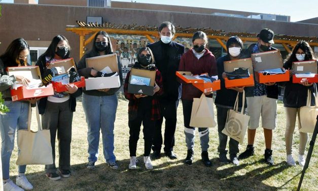Giving thanks, giving back:  Richardson delivers shoes for Native students
