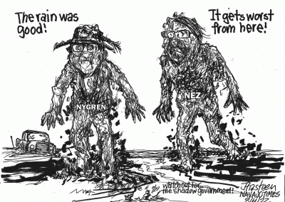 Buu Nygram and Jonathan Nez rise up out of the mud. Nygren says the rain was good. Nez says it gets worse from here. Sidekicks say watch out for the shadow government.