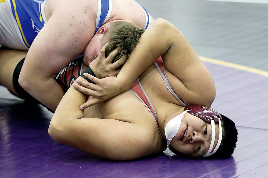 Bloomfield grapplers overtake Aztec at region meet