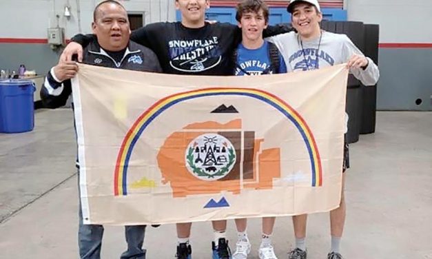 Snowflake grappler caps perfect season with state title