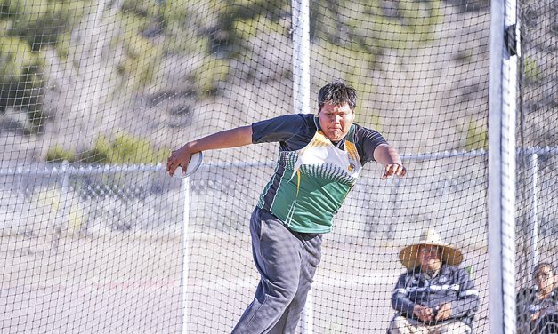 Thoreau discus thrower meets 3A state mark