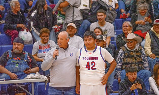 Holbrook senior hits milestone, scores 1000th point