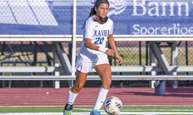 Etsitty’s quiet dominance helps Xavier secure 5th straight state title