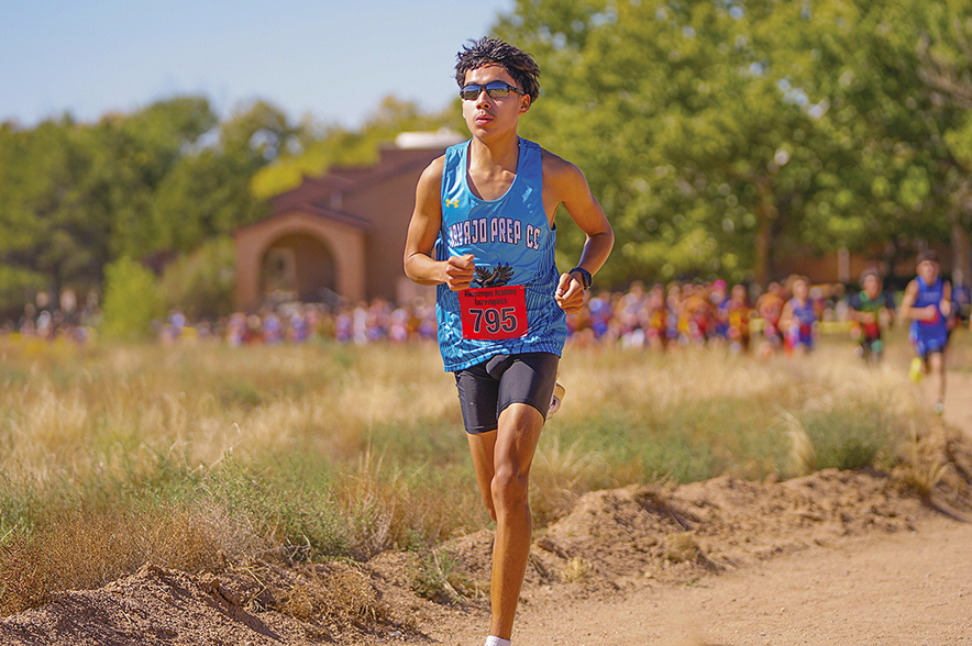 Navajo Prep’s Elijah England overwhelms 3A field